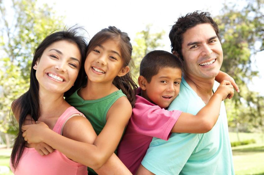 mother, father, daughter, and son smiling in anderson