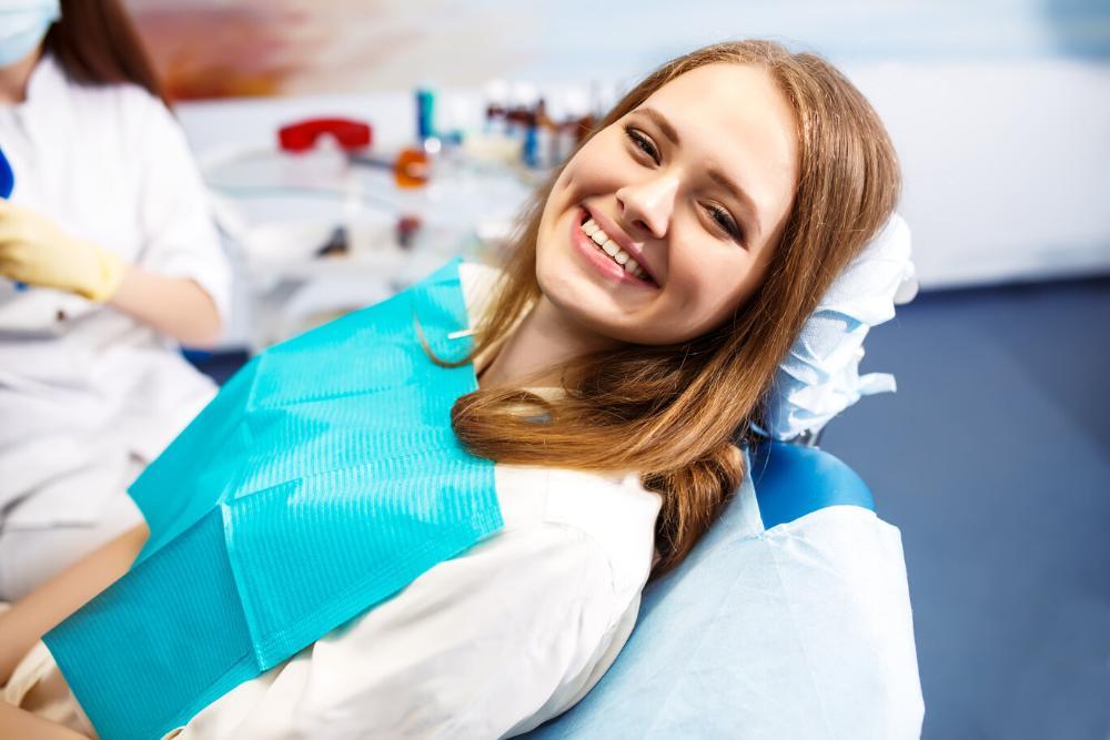 woman smiling after dental cleaning