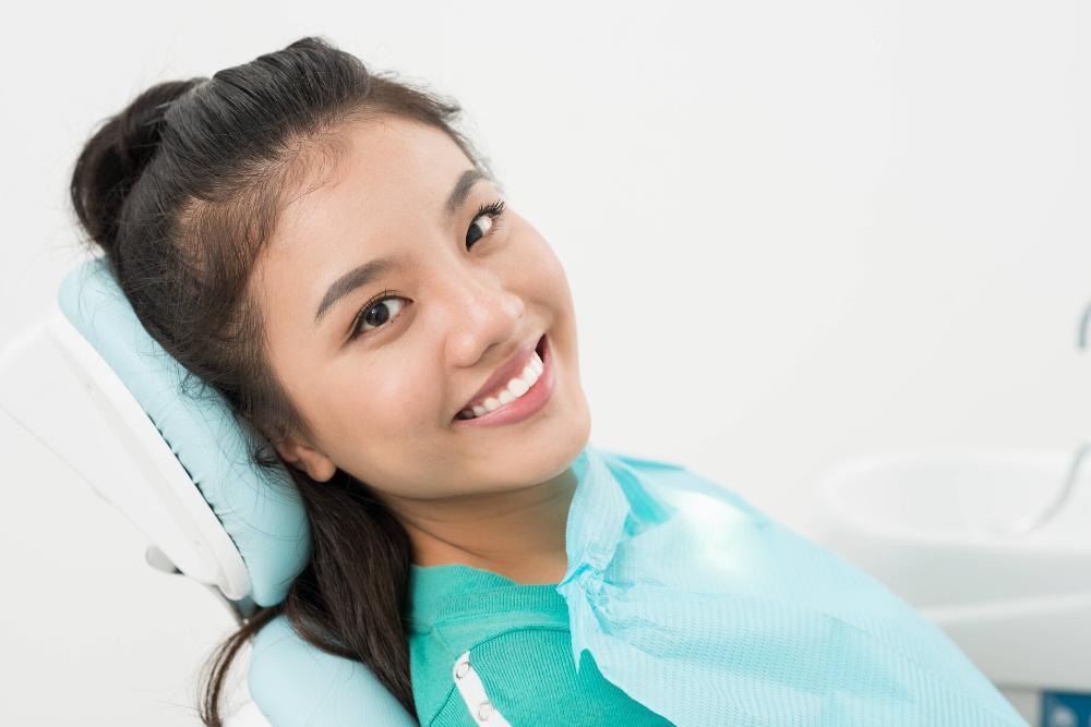 woman sitting in dental chair