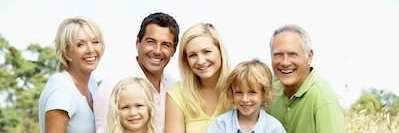 multi generational family smiling in anderson sc