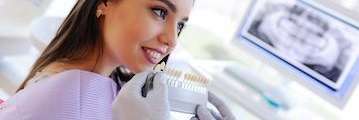 woman smiling during a cosmetic consultation in anderson