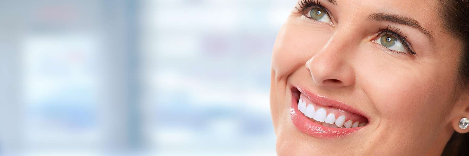 woman smiling after getting cosmetic dentistry in Anderson, SC