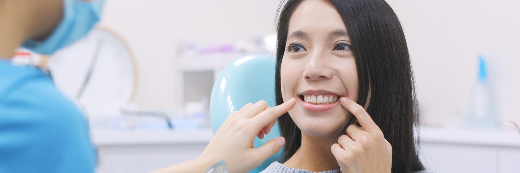 woman smiling after root canal therapy